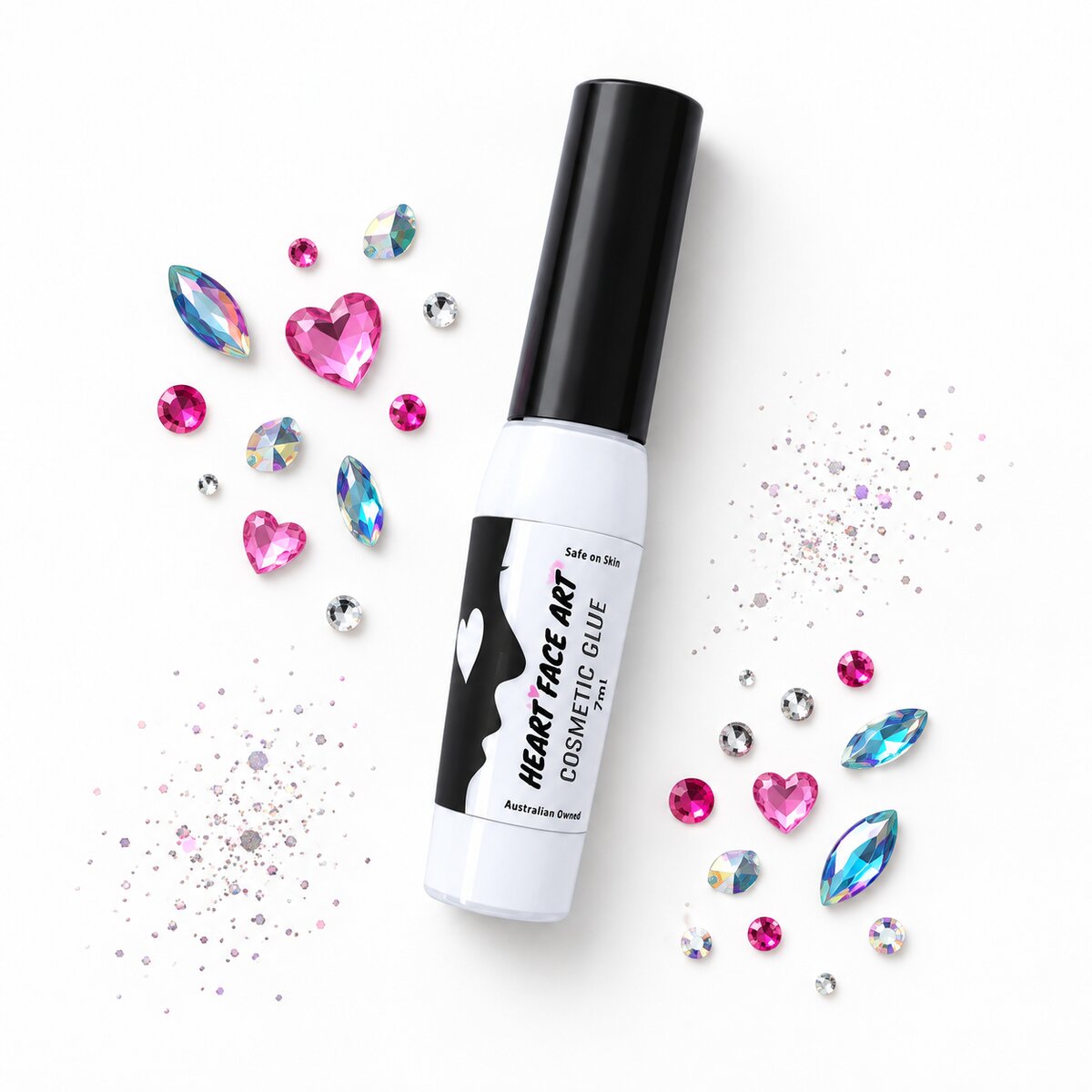 Heart Face Art Cosmetic Glue 7ml flat lay with face painting gems, rhinestones and cosmetic glitter