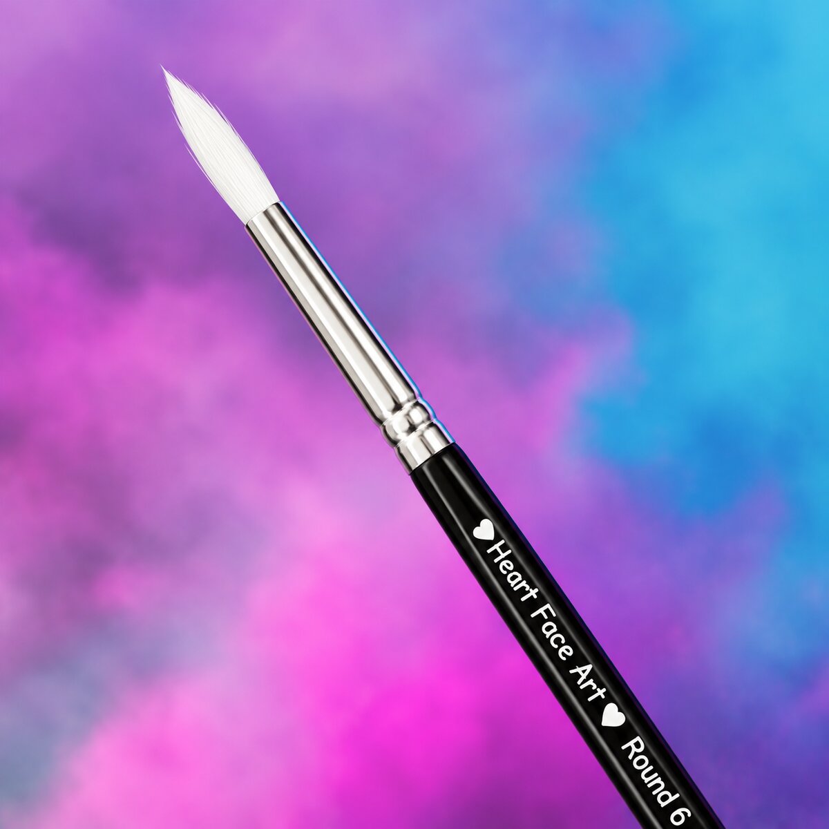 Close-up of the Heart Face Art Round No.6 brush tip showing its fine pointed shape for detail work